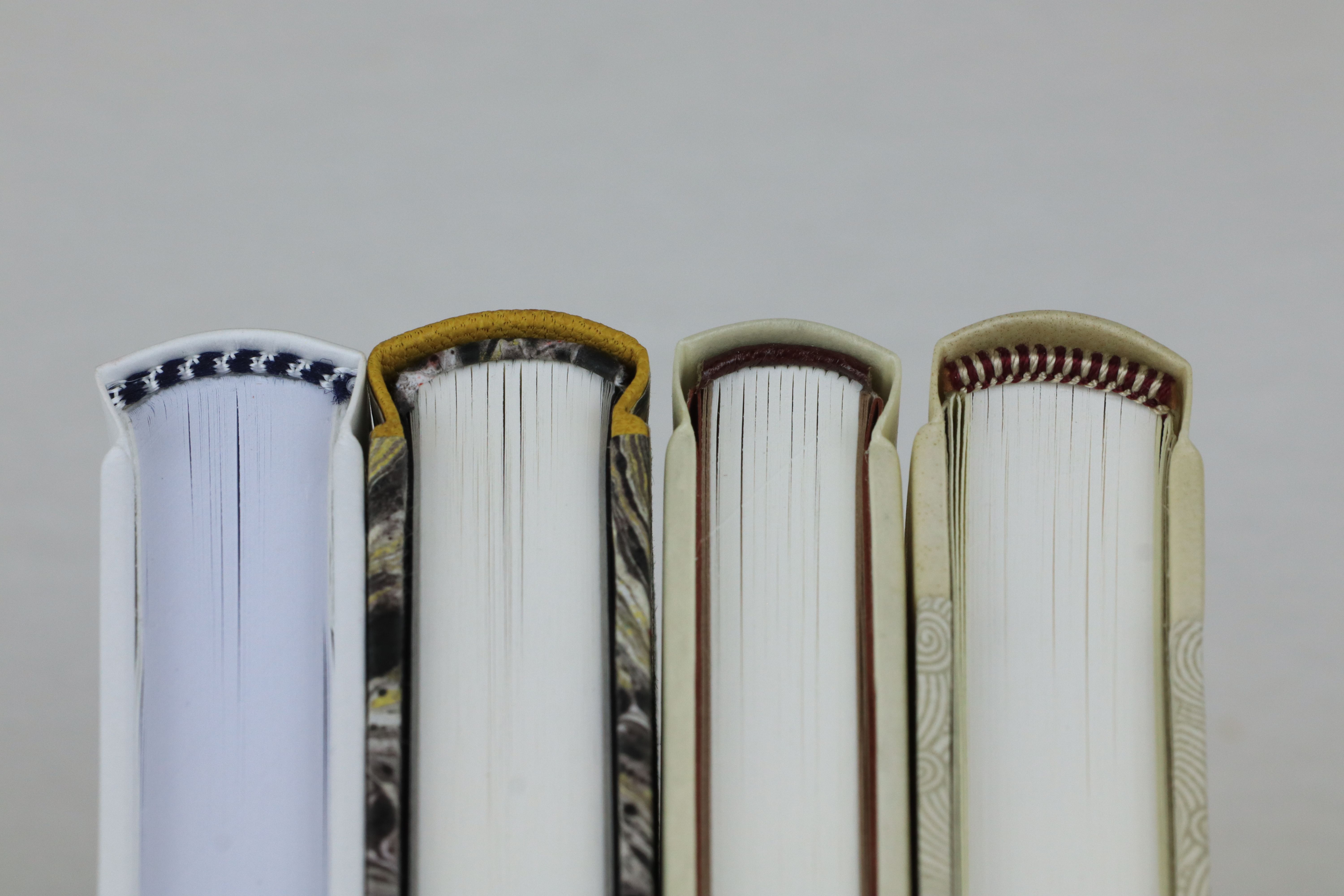 Varianten von Kapitalen